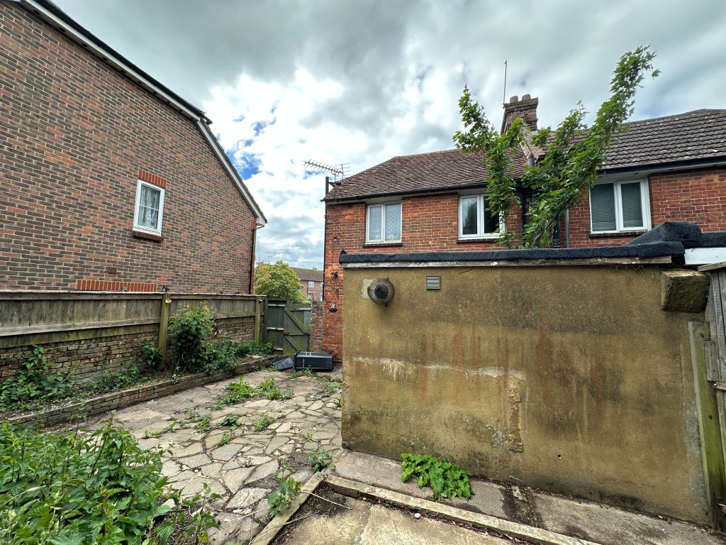 Lot: 147 - TWO-BEDROOM SEMI-DETACHED HOUSE FOR IMPROVEMENT - Back of Property from the garden